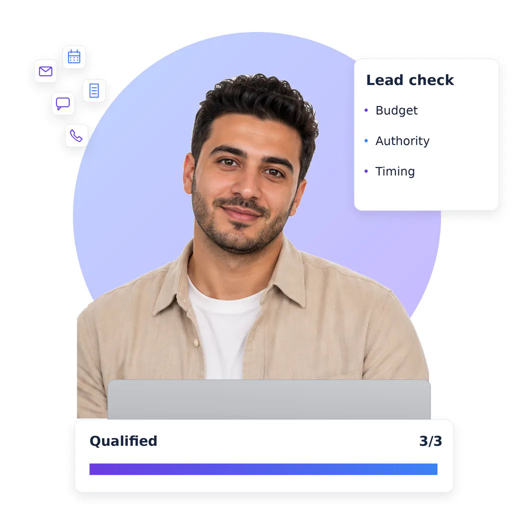 Lead generation virtual assistant, a smiling bearded man with short dark hair, beige overshirt and white tee, at a laptop