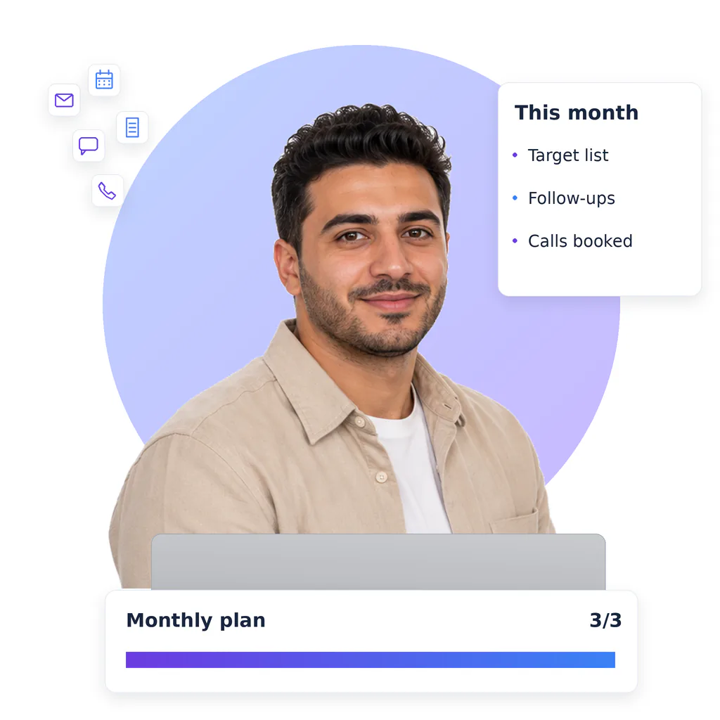 Lead generation virtual assistant, a smiling bearded man with short dark hair, beige overshirt and white tee, at a laptop