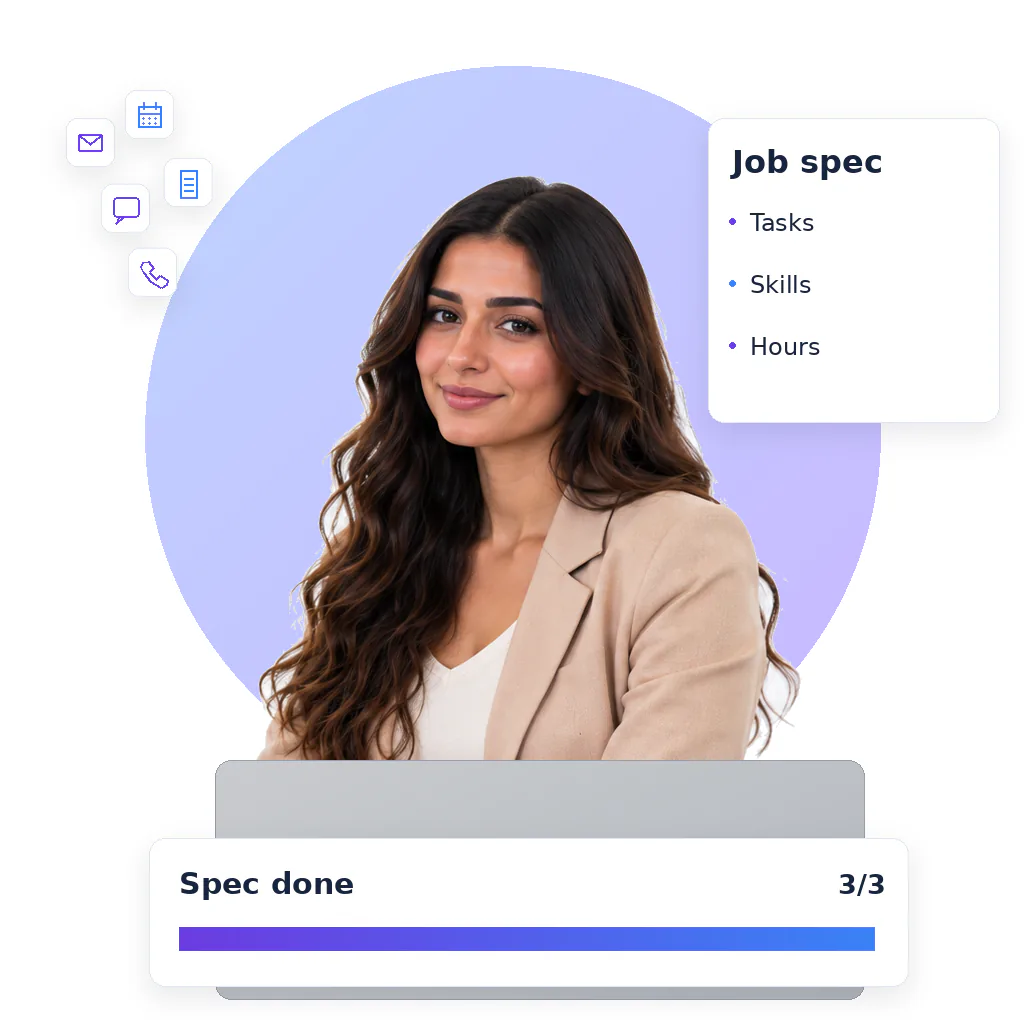Admin virtual assistant, a smiling woman with long wavy dark hair in a beige blazer over a white top, at a laptop