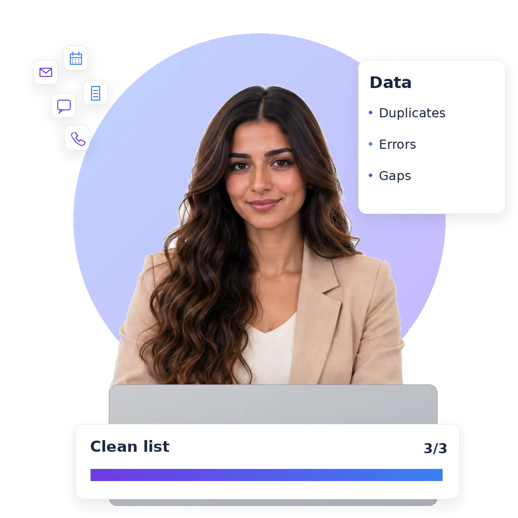 Admin virtual assistant, a smiling woman with long wavy dark hair in a beige blazer over a white top, at a laptop